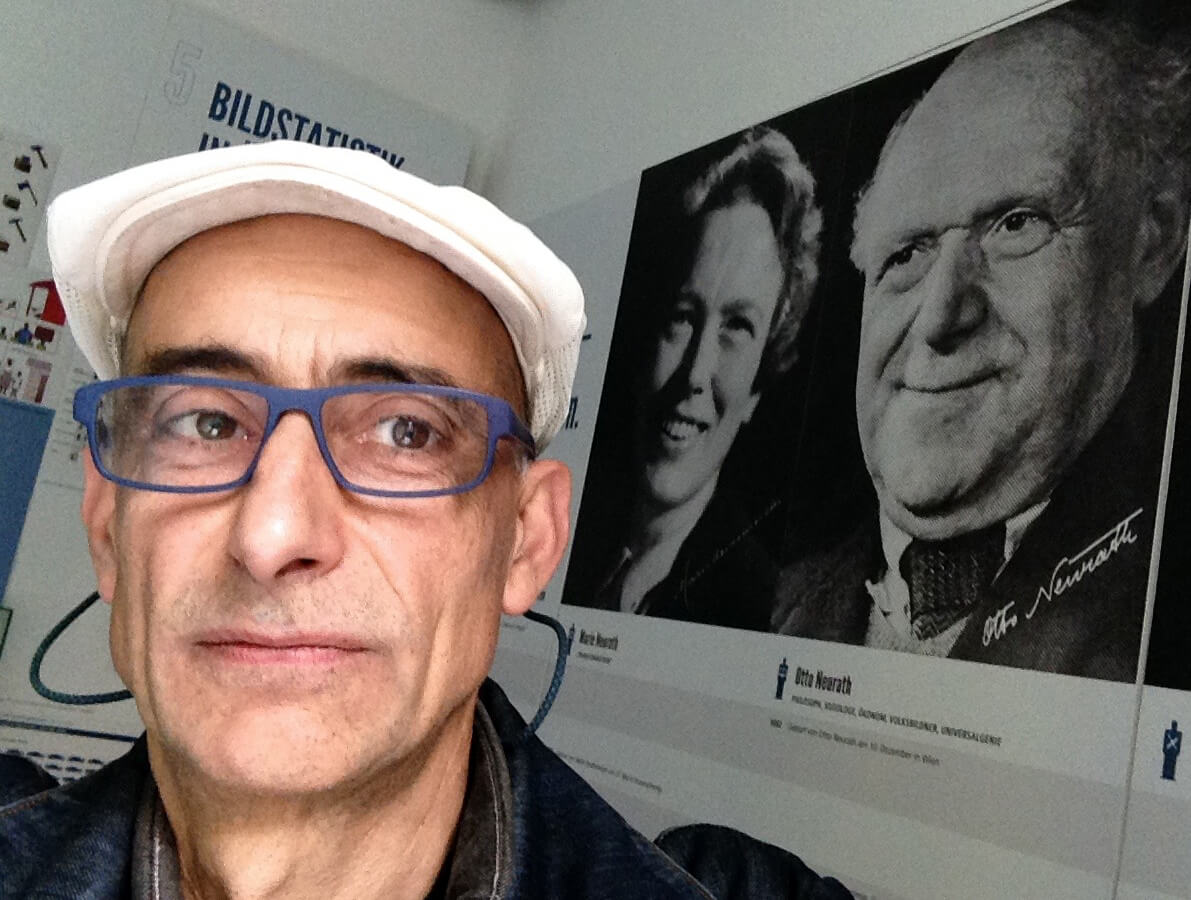 Photograph of Prof. Trogu took a selfie with Otto and Marie Neurath while visiting the Museum of Economy in Vienna in 2015
