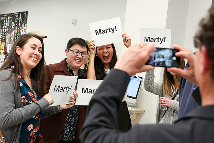 Students with signs that say "Marty!"