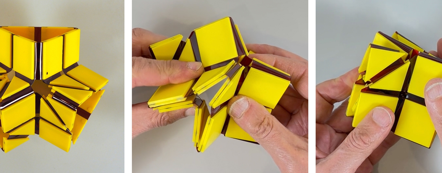 Hands folding an origami-like material, the prototype of Prof. Trogu