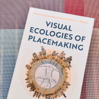 Photograph showing the book Visual Ecologies of Placemaking on a table. 